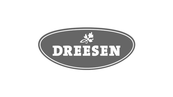 Dreesen Logo in weißer Schrift auf grauem ovalen Hintergrund mit einem kleinen Kräuter-Symbol darüber